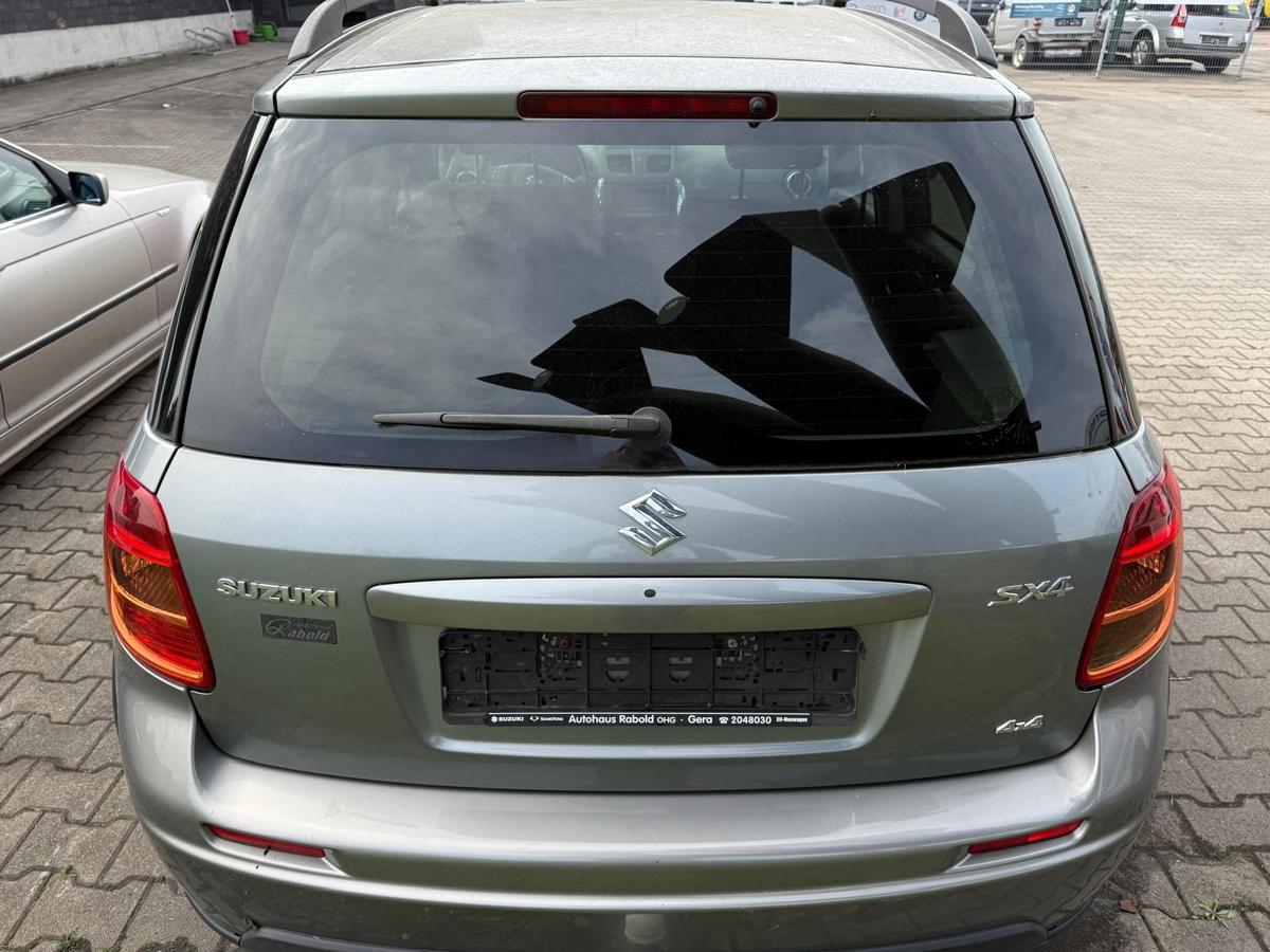 Suzuki SX4 EY original Heckklappe mit Scheibe ZCD Galactic Grey Rohbau BJ11
